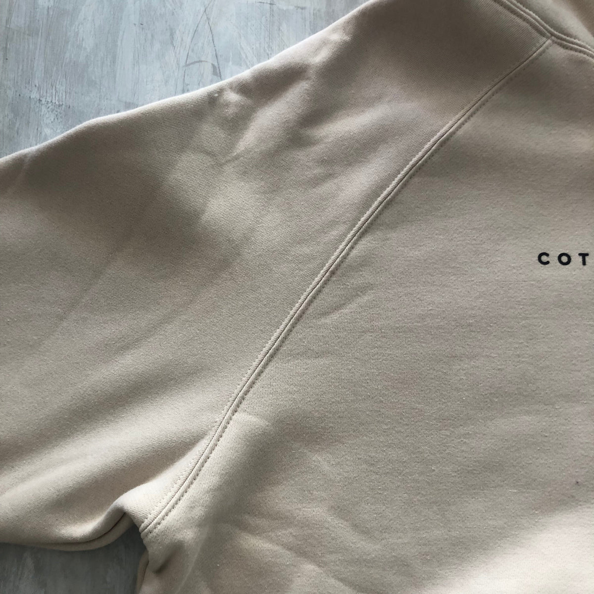 Natural Premium Unisex Hoodie - White text