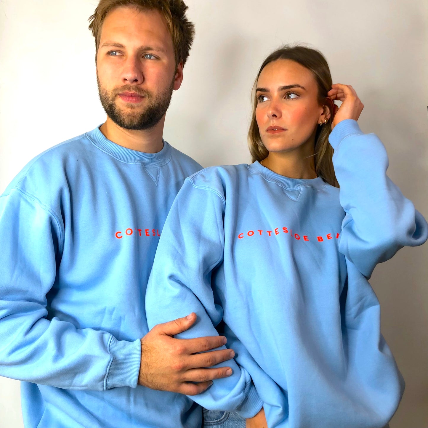 Sky Blue Unisex Crew Neck - Orange Text